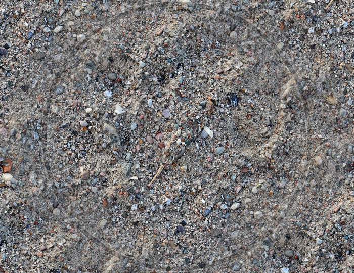 Photo Realistic Seamless Texture Pattern Of Sand At A Beach