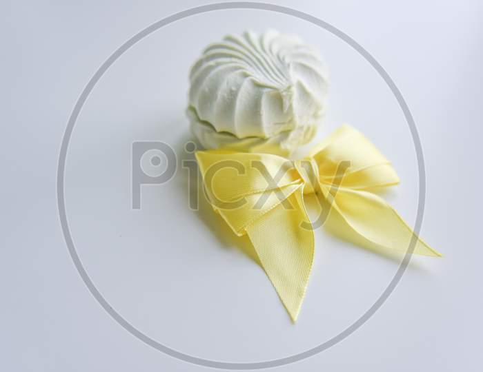 Selective Focus At The Light Green Marshmallow With Yellow Ribbon