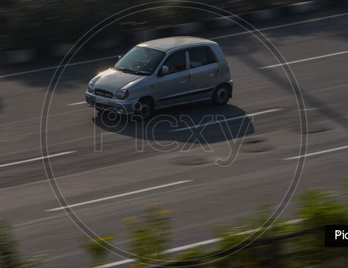 Fast moving car on Outer Ring Road, Hyderabad