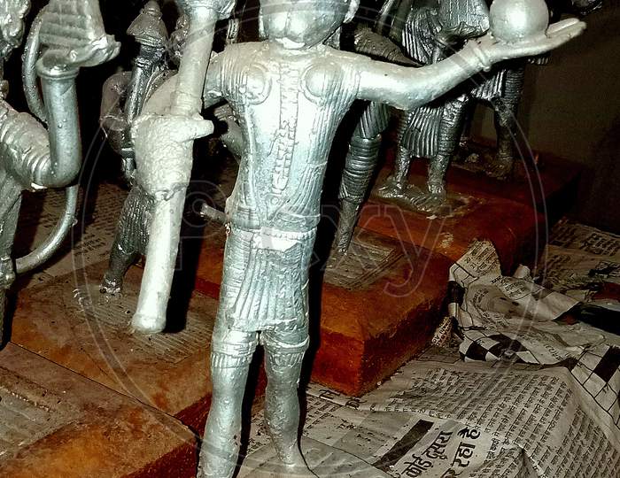 metal sculpture of lord hanuman