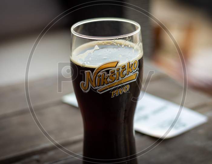 A Glass Of Cold Niksic Dark Beer, Served In A Restaurant In Belgrade, Serbia