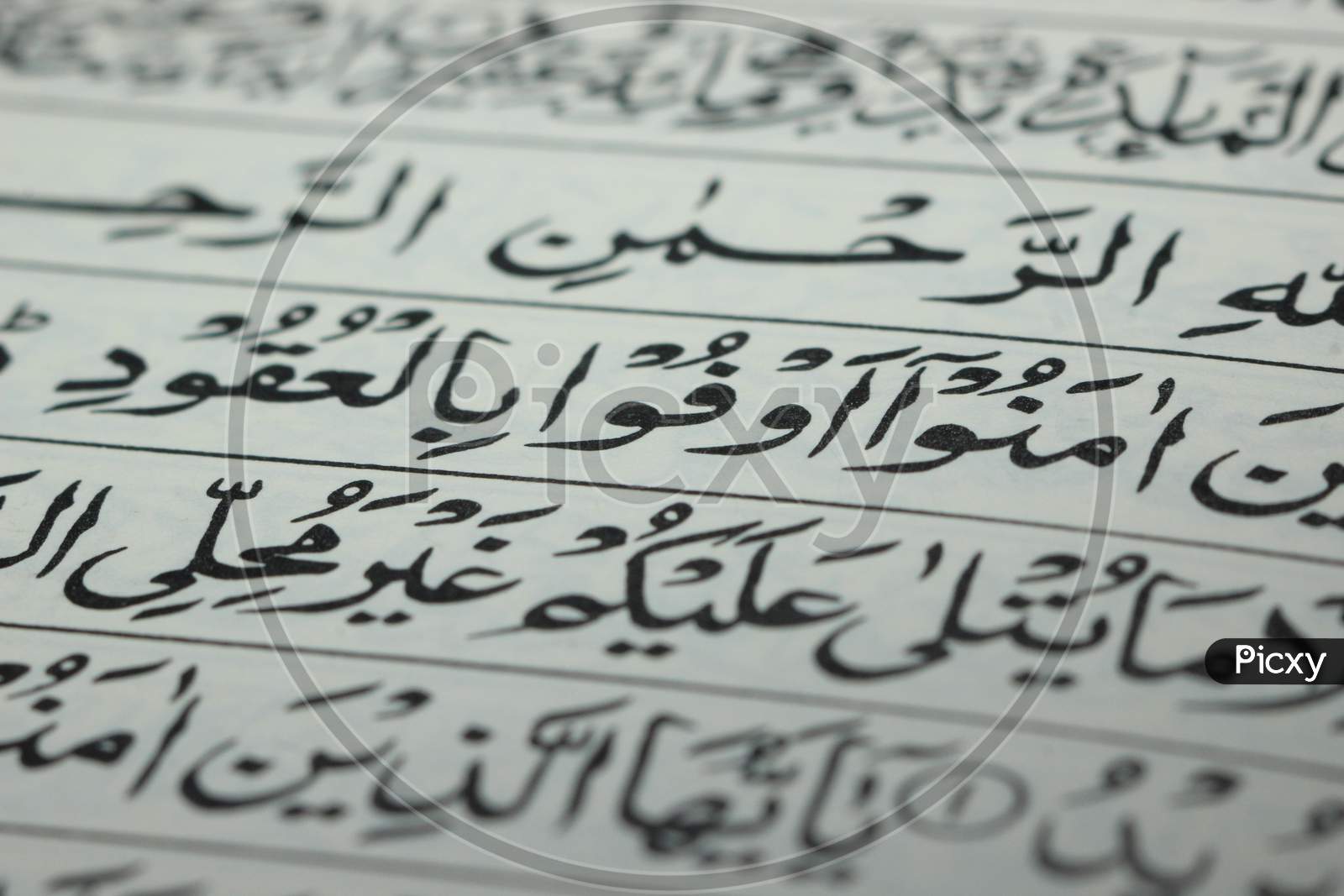 Closeup Shot Of Islamic Book Quran With Golden Arabic Calligraphy