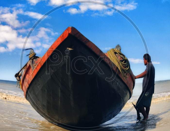 The boat & the fisherman