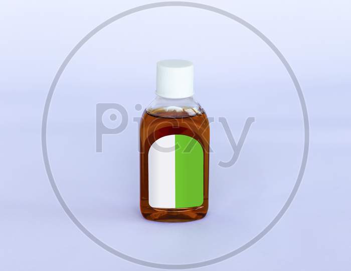 Small Isolated Antiseptic Liquid Bottle On A Neutral Background