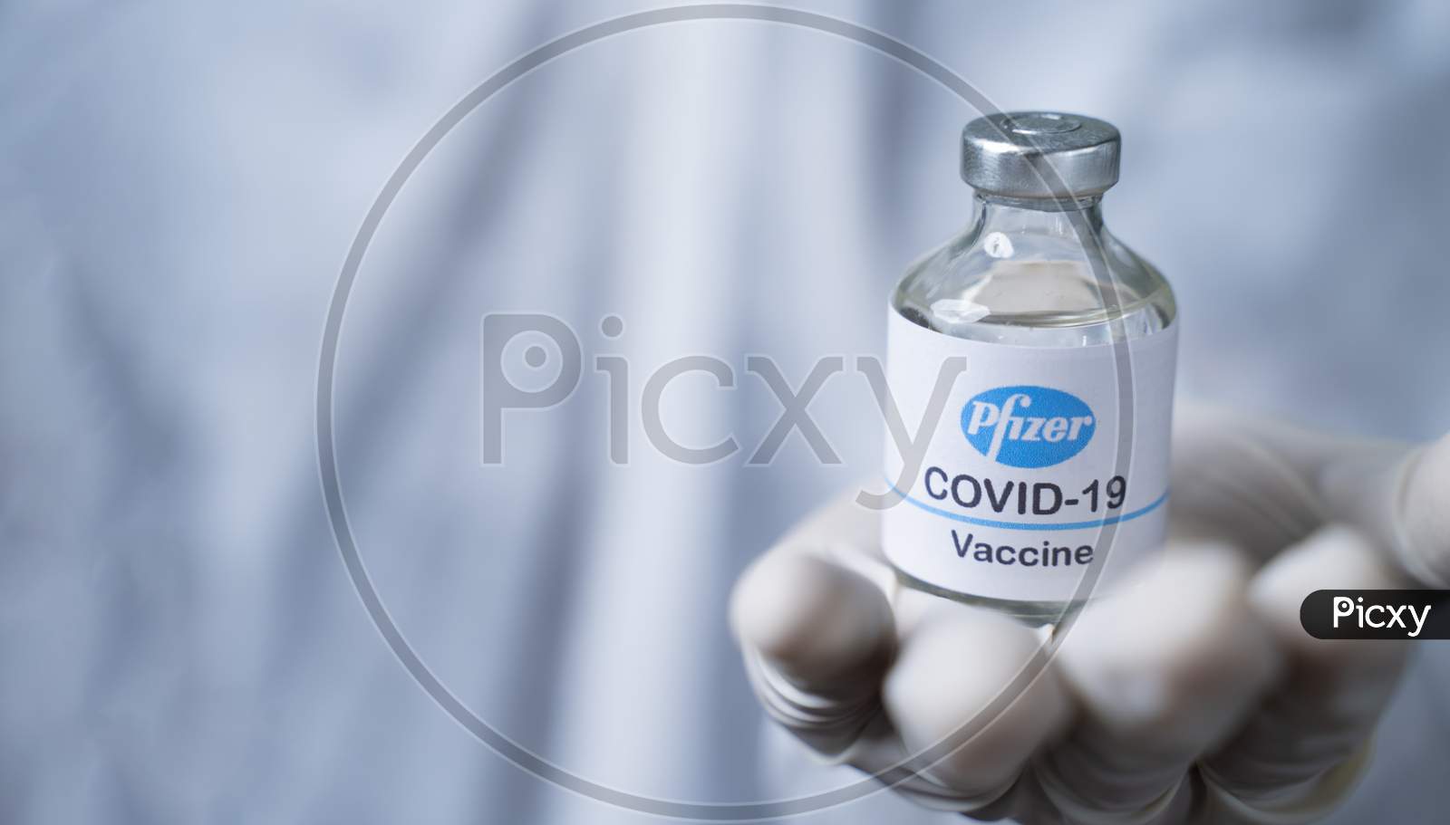 Maski, India - Nov 12,2020 : Close Up Of Doctor Hands Giving Pfizer Biontech Vaccine To Protect From Coronavirus Or Covid-19 Pandemic.