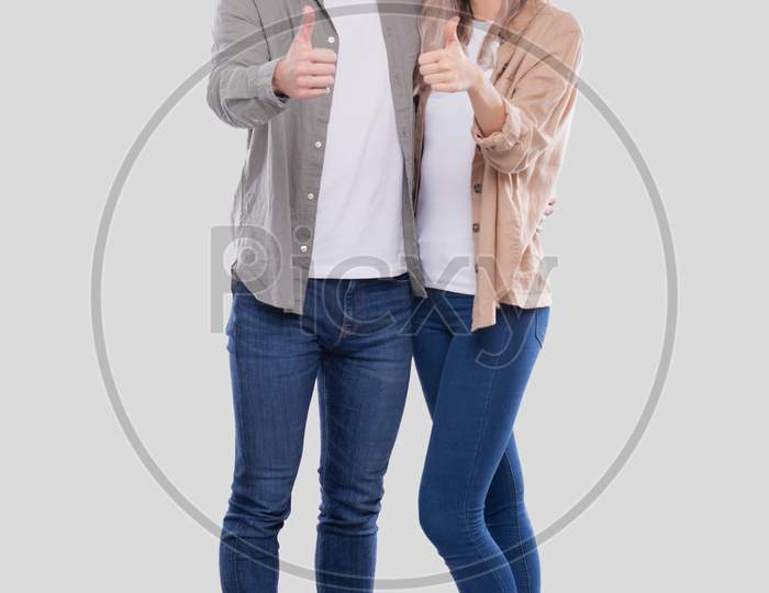 Couple Showing Thumb Up Standing Isolated. Man And Woman Hugging, Lovers, Friends, Couple Concept