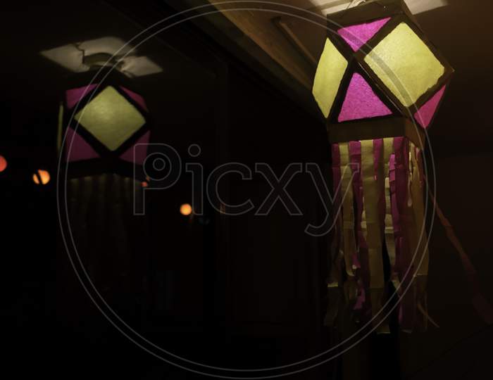 Colorful Diwali Lantern Or Lamp Hanging With Reflection On The Glass
