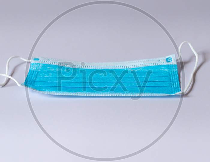 Surgical Protective Face Mask Isolated On A White Background