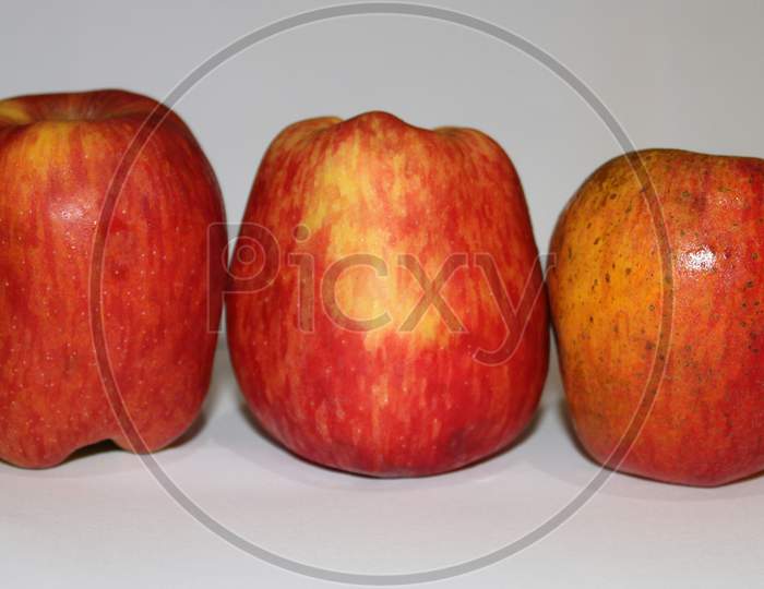 Malus Domestica, Three Honeycrisp Apple With White Background.