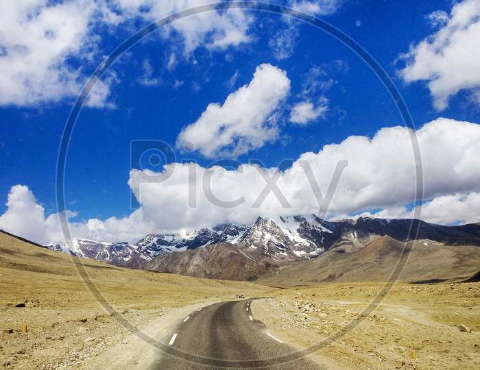 Road meets mountains