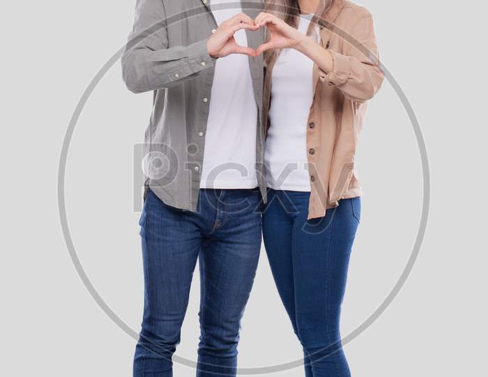 Couple Showing Heart Sign. Couple Standing Showing Love Sign. Relationship, Family, Lovers, Friends Concept
