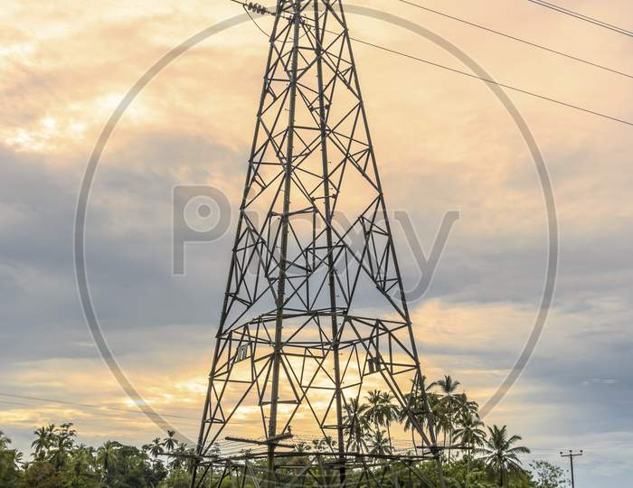 High Voltage Power Lines Goes Through Paddy Fields In Rural Village Landscape Photography