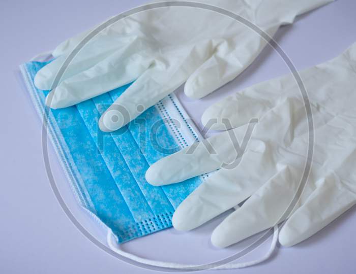 Medical Face Mask And Pair Of Latex Medical Gloves