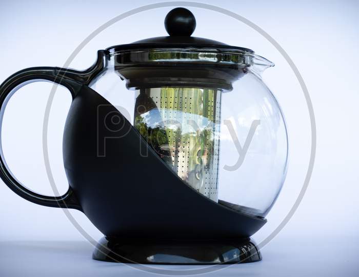 Black Glass Coffee Pot In Neutral Background Side View