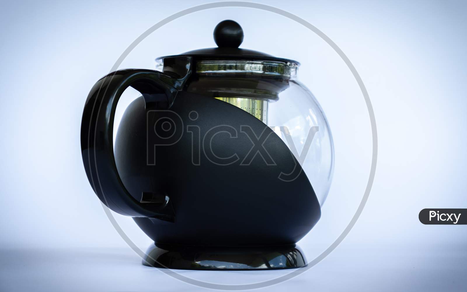Black Glass Coffee Pot In Neutral Background Angled Side View