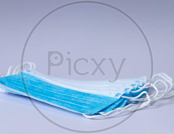 Surgical Protective Face Masks Collection Closeup In White Background