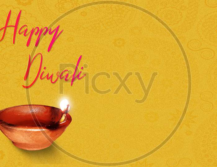 Happy Diwali Stylish Text Greetings With Clay Lamp Flame In Golden Background