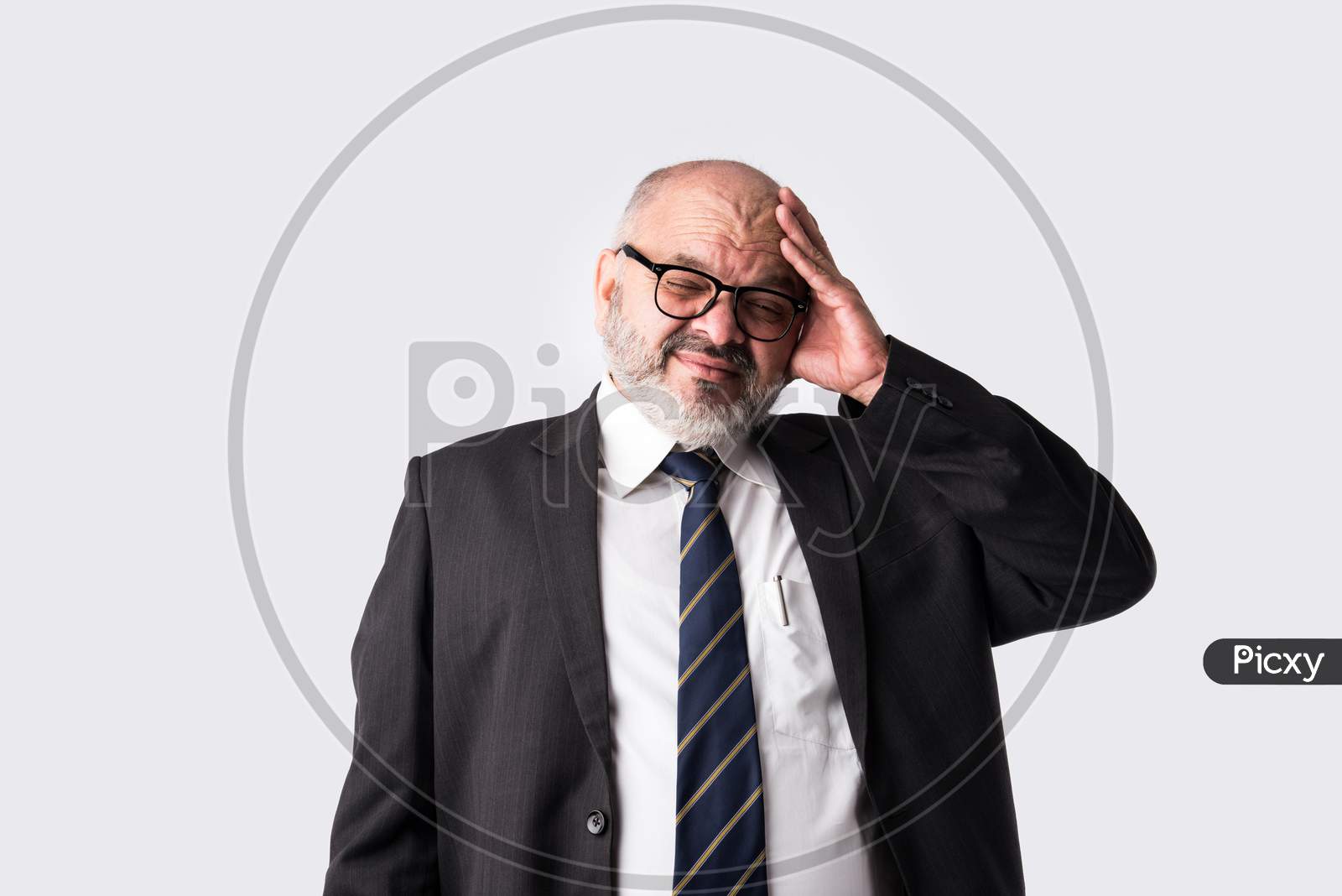 Indian Old Or Senior Businessman Having Headache, Frustration With Confused Expressions