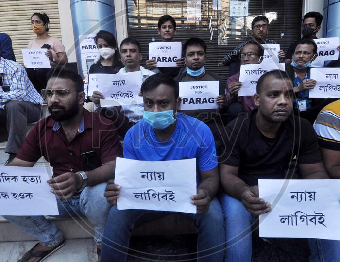 Journalists hold placards as  they  protest against the alleged murder of a  journalist Parag Bhuyan by unidentified miscreants, in Guwahati, Friday, Nov. 13, 2020.