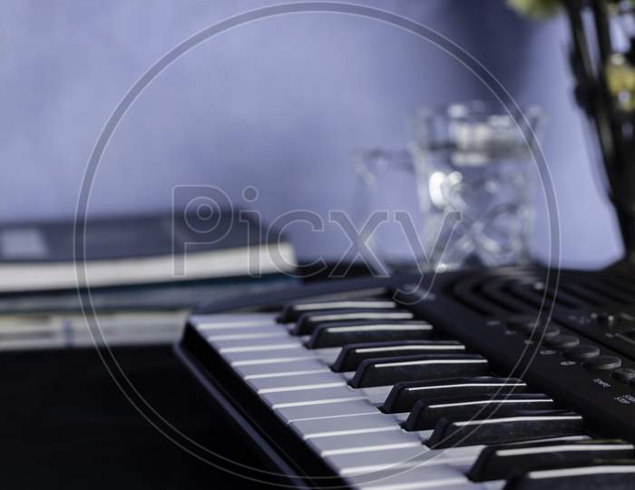 Selective Focus Of Piano Or Keyboard On White Background