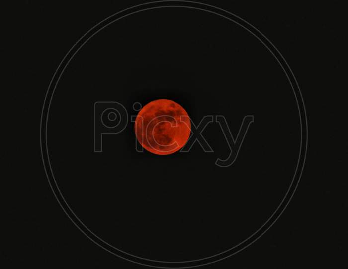 A very full Red moon on purnima