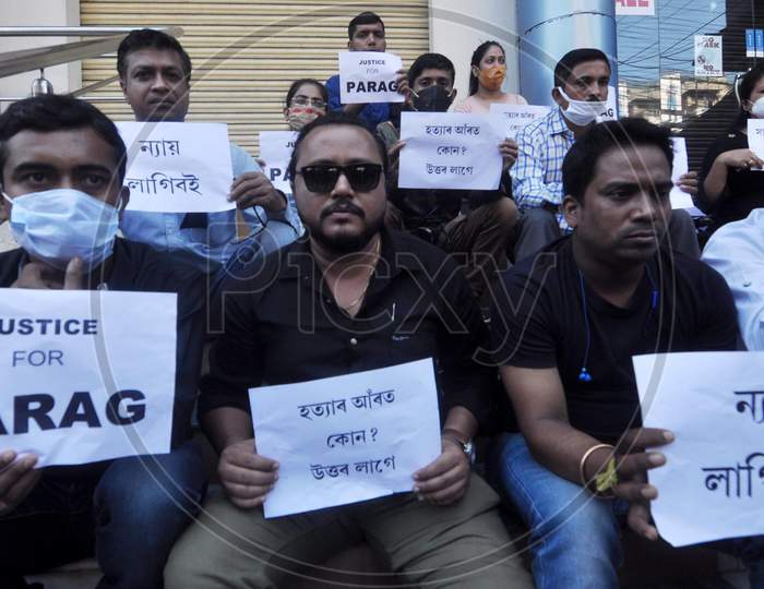 Jornalist hold playcard as  they  protest against the alleged murder of a  journalist Parag Bhuyan by unidentified miscreants, in Guwahati, Friday, Nov. 13, 2020.
