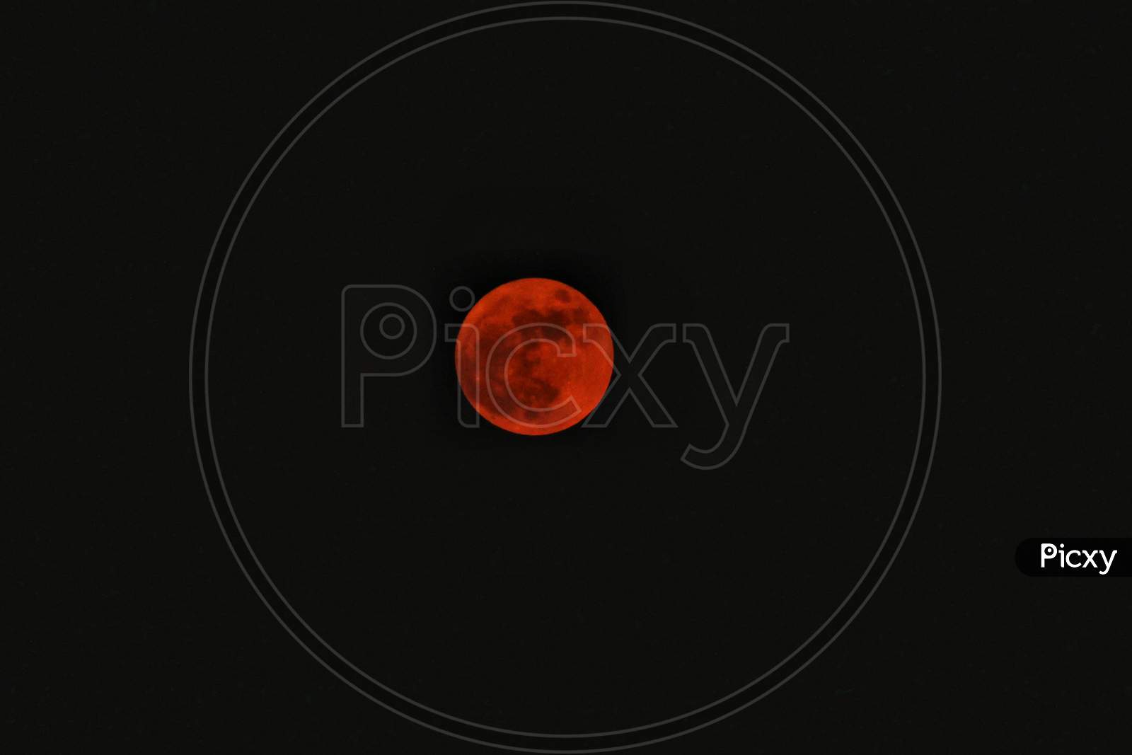 A very full Red moon on purnima