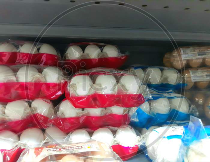 eggs in supermarket shelf