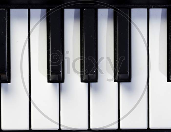 Top Close-Up View Of Keys Of Piano Or Keyboard