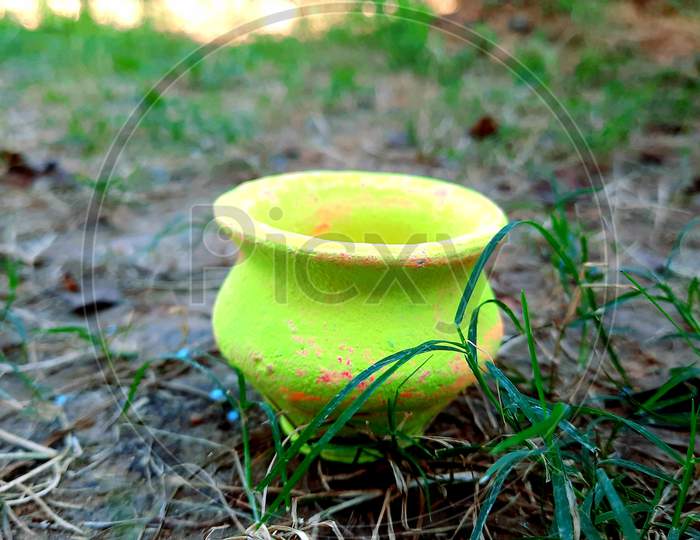 A green Diwali toy
