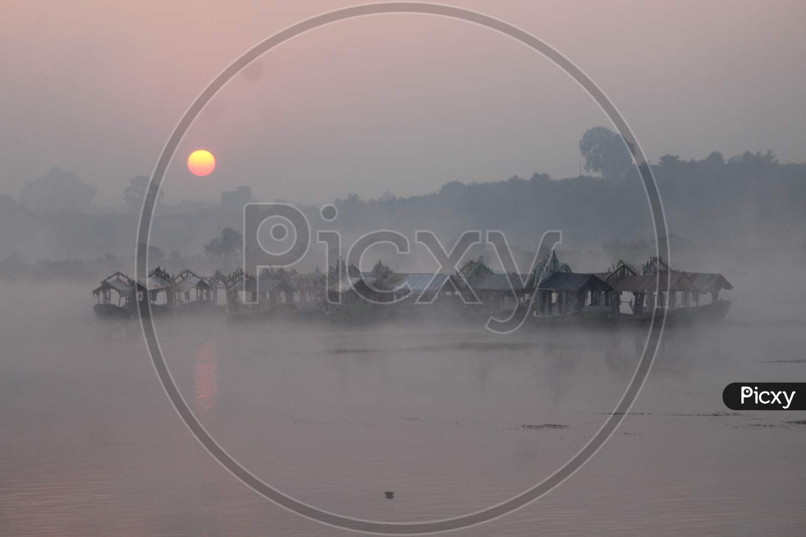 Image of Group of boats middle in the river Narmada early morning ...