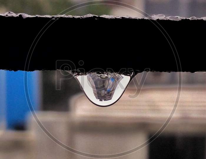 Building reflection in drop