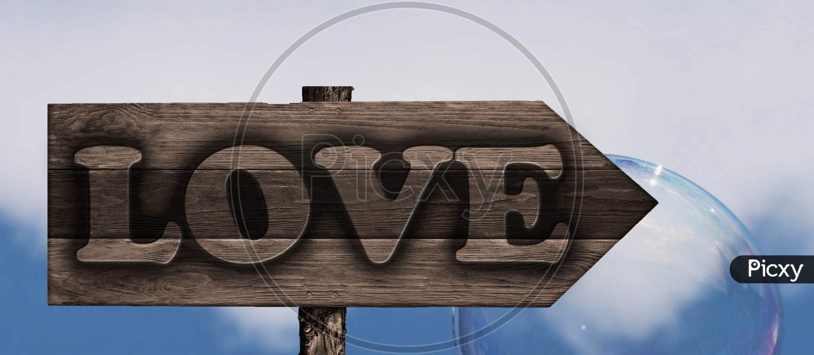 Love Sign On Wood Arrow