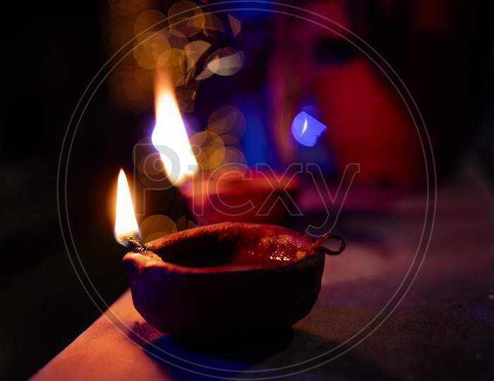 Lighted diya lamp in the auspicious occasion of Diwali