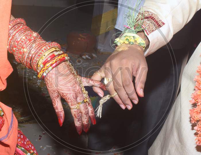 Bride & groom  holding hand