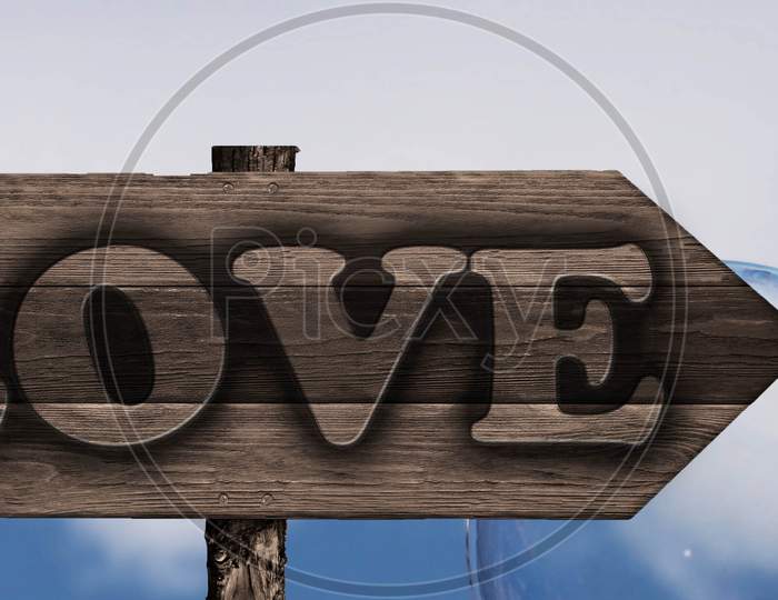 Love Sign On Wood Arrow