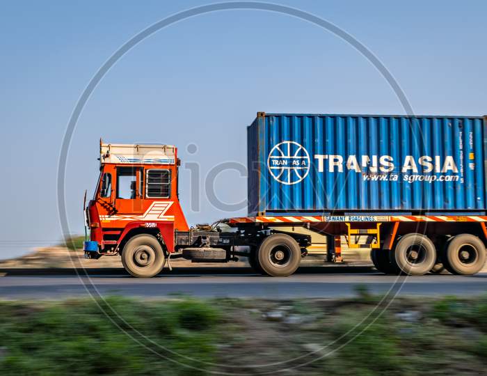 Trans-Asia Container On Trailer , Speeding Towards Mumbai On Highway.