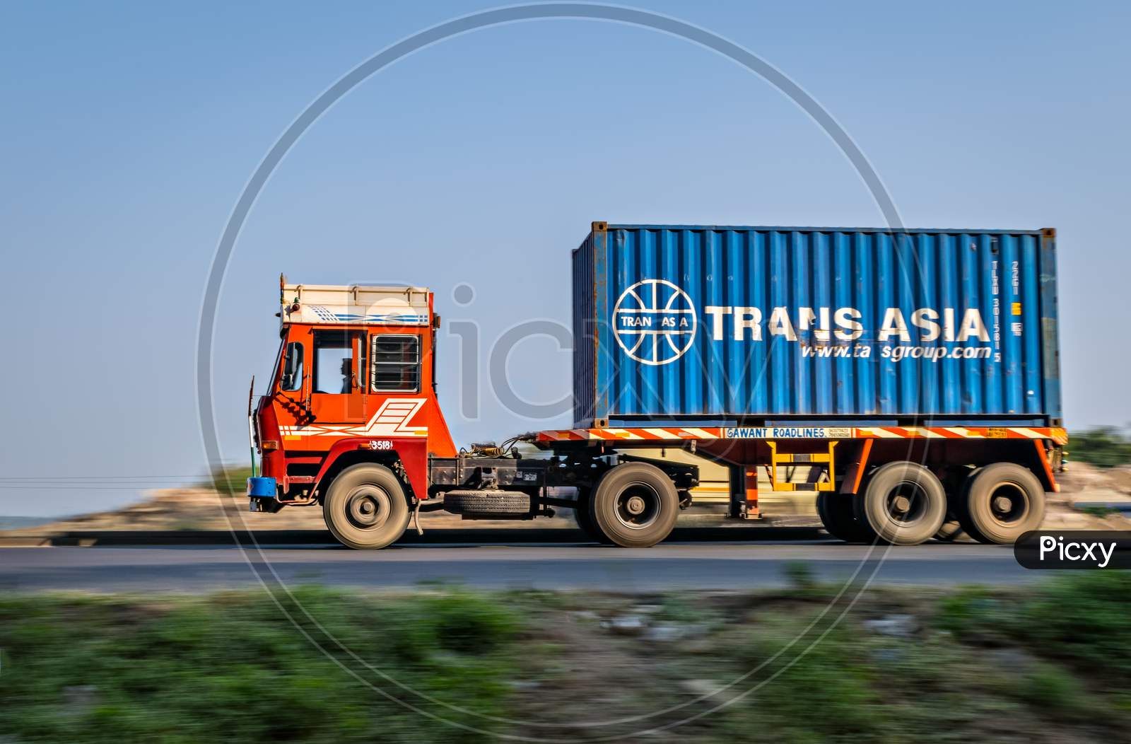 Trans-Asia Container On Trailer , Speeding Towards Mumbai On Highway.