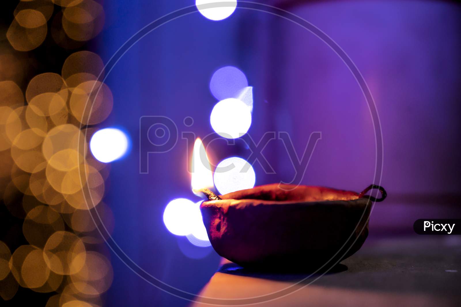 Lighted diya lamp in the auspicious occasion of Diwali