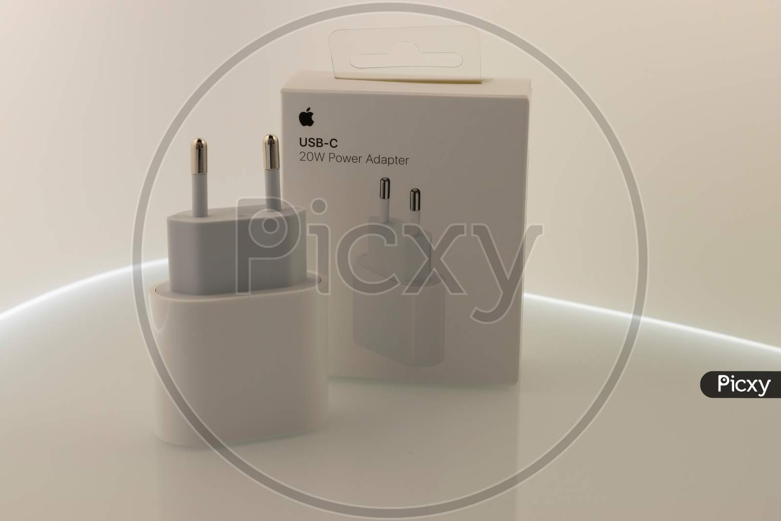 Frankfurt, Germany - November 13th 2020: A german photographer bought the new iPhone 12 Pro Max with MagSafe accessories as the charger, taking pictures of the unboxing.