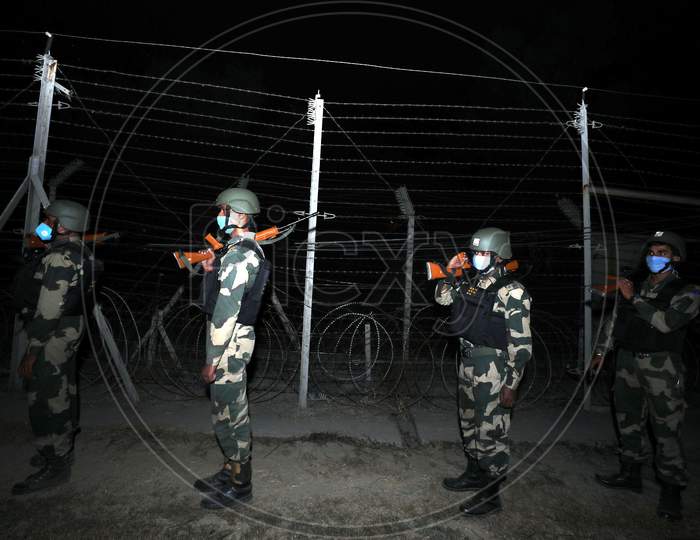 Border security force (BSF) soldiers patrol at International border outskirts in Jammu ,14 November,2020.