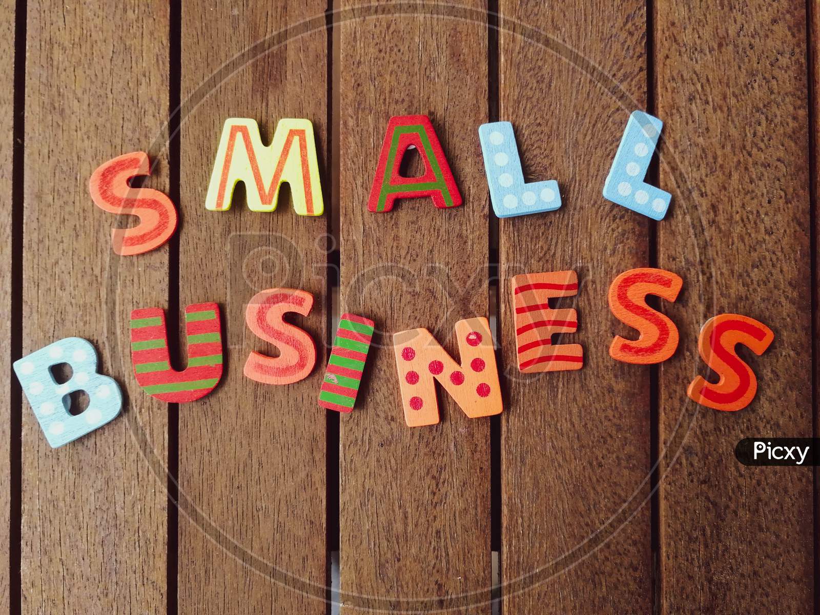 Small Business Letters On Wood Background