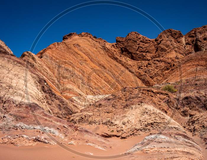 Geological Formations In The Talampaya National Park In The Argentine Republic. Huge Reddish Rocks