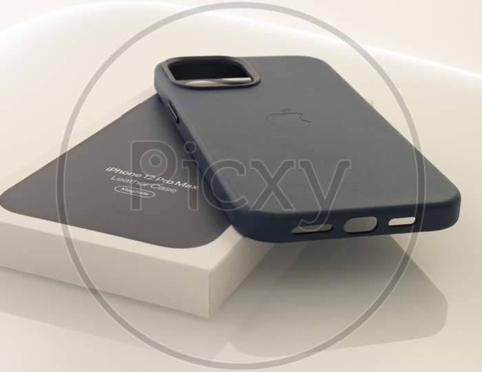 Frankfurt, Germany - November 13th 2020: A german photographer bought the new iPhone 12 Pro Max with MagSafe accessories as the iPhone case and the magnetic wallet, taking pictures of the unboxing.