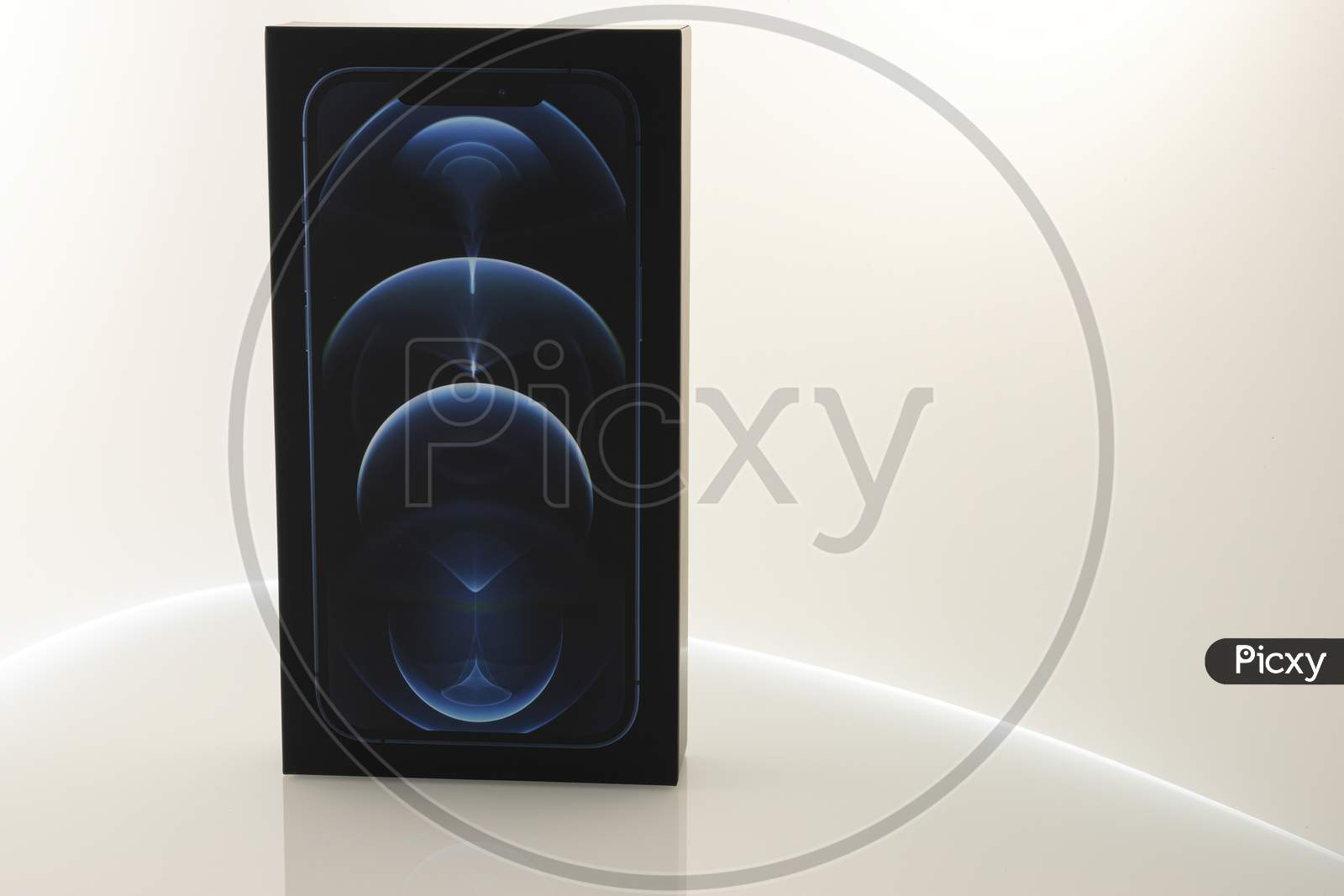 Frankfurt, Germany - November 13th 2020: A german photographer bought the new iPhone 12 Pro Max in the color Pacific Blue, taking pictures of the unboxing after it was delivered.