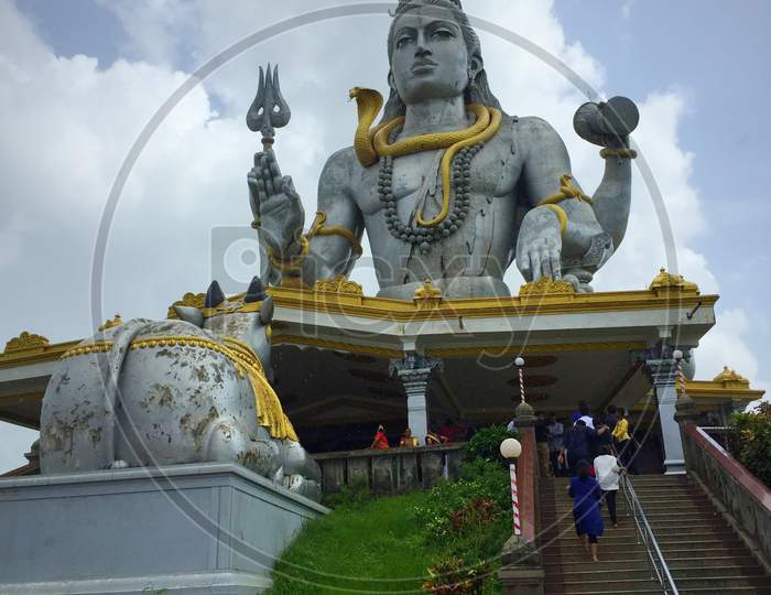 Statue of Lord Shiva was built at Murudeshwar temple on the top of hillock which overlooks the Arabian Sea and it is 37 meters in height.