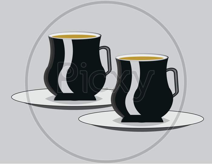 Black Tea cups and saucer filled with tea