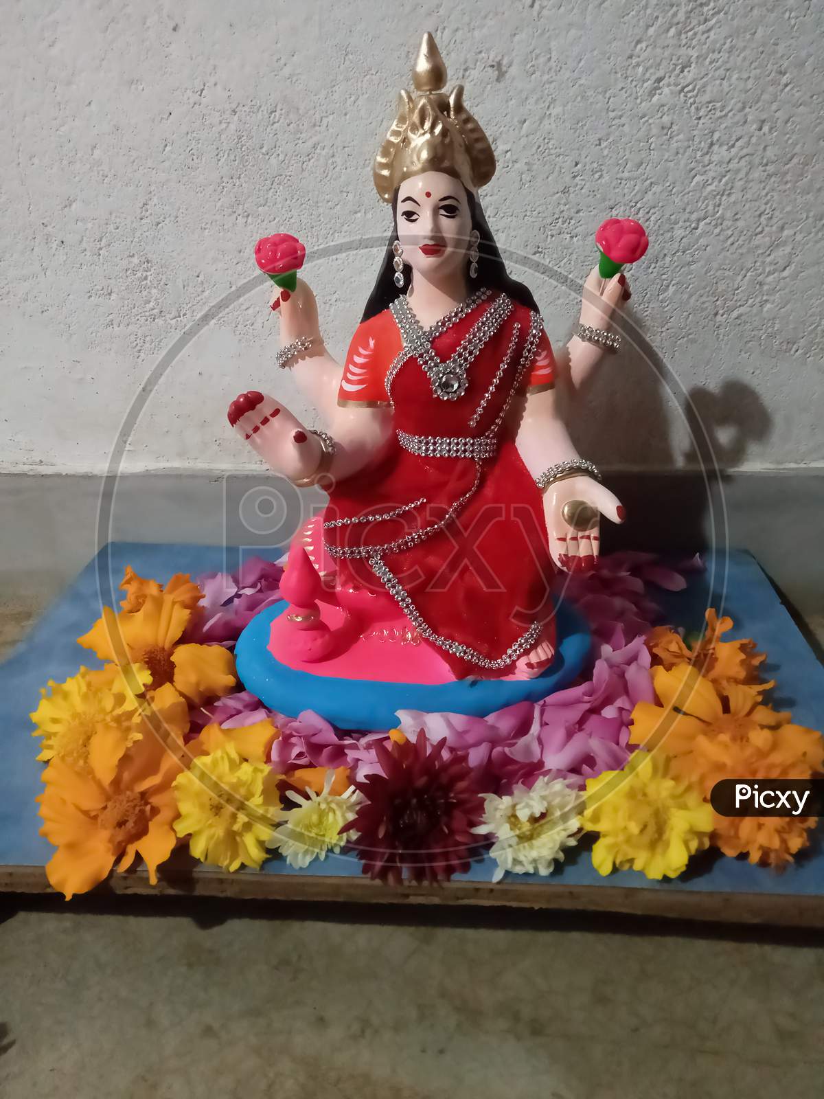 Hindu God Ganesha Ganesha Idol On With Colorful Floral Background Stock  Photo - Download Image Now - iStock
