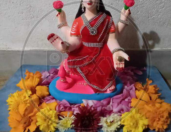 Natural flower decoration with worship of god laxmi ( laxmi ji indian god)