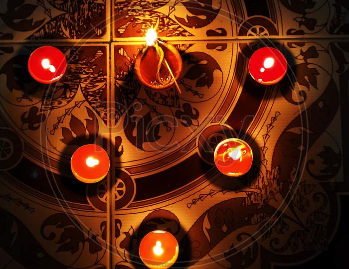 Diya Lighten-Up In Diwali Designed In A Beautiful Shape In Floor